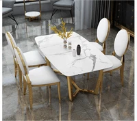 Nordic style luxury marble dining table and chair combination Modern minimalist dining table Household small oval dining table