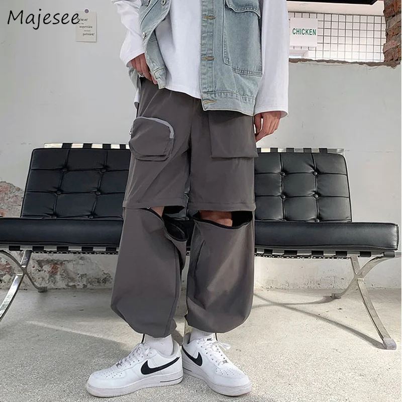 

Men Casual Pants Solid Designer Pockets Elastic Waist Bundle Cargo Hip Hop Teenagers Loose Males Large Size Trousers S-3XL Chic