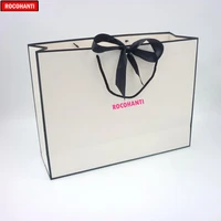 100x custom logo printed luxury gift shopping paper bag black frame white paper gift bags with lovely bowknot ribbon design