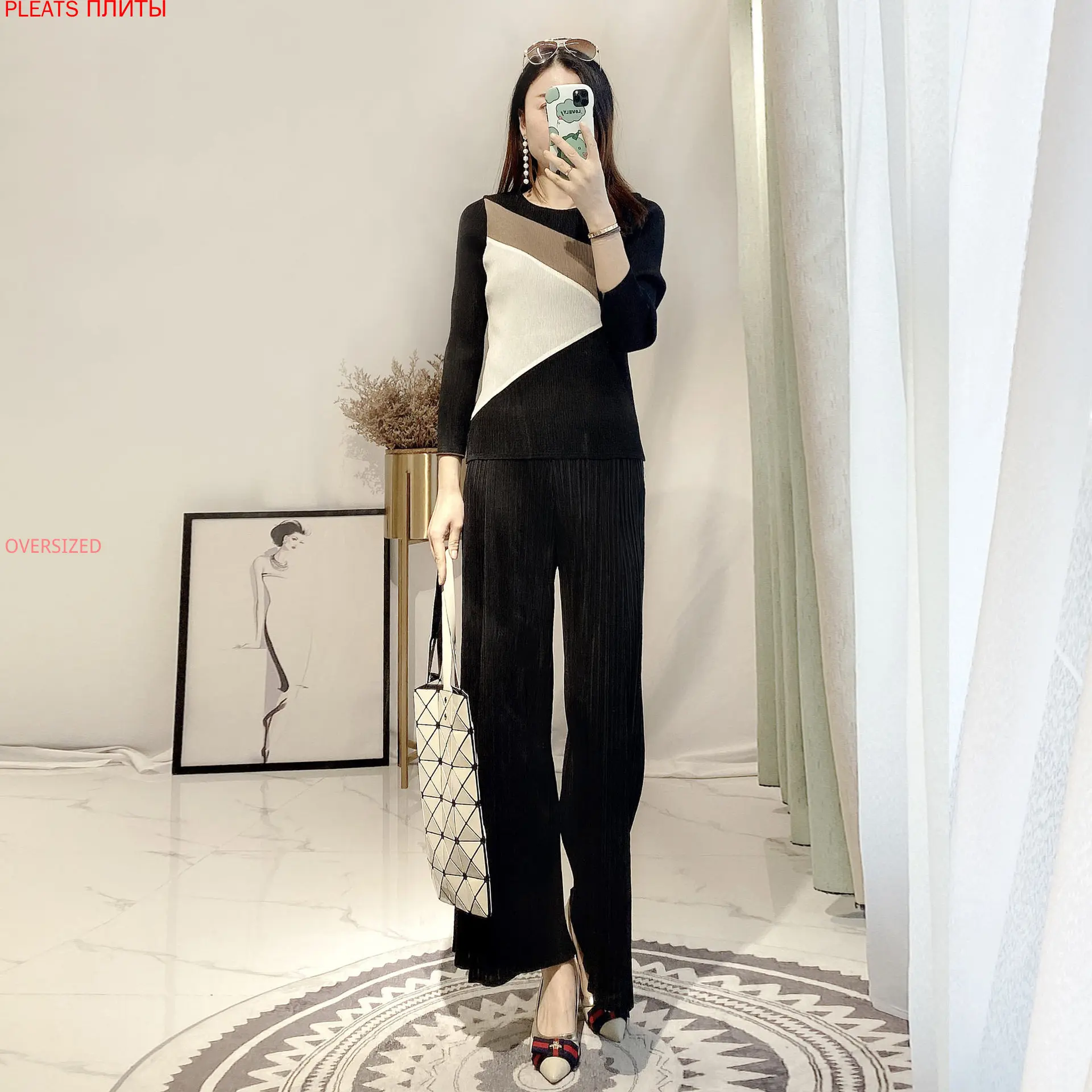 

Miyake Folds Fashion T-shirt Spring and Summer New Casual Bottoming Shirt Thin Three-quarter Sleeves Round Neck Top Women