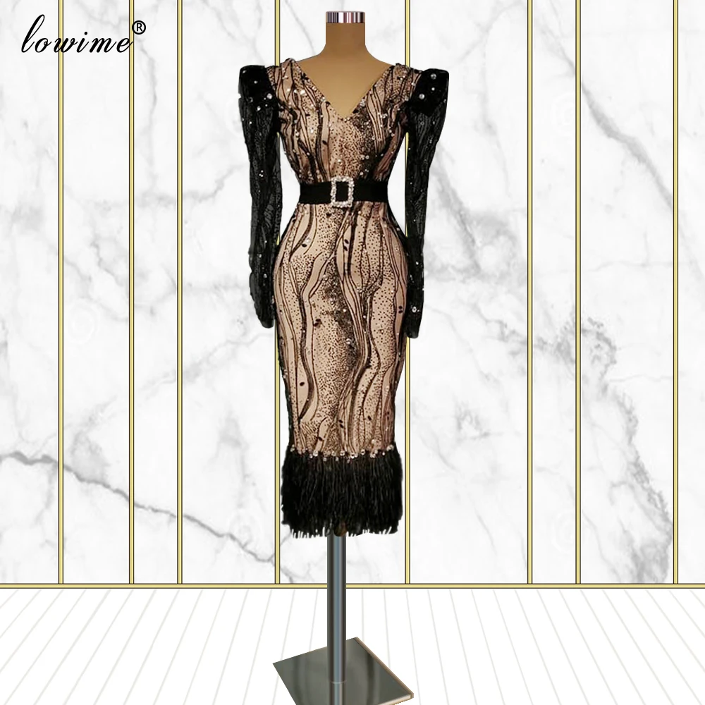 

Коктейльные платья длиной до середины икры с длинным рукавом и V-образным вырезом