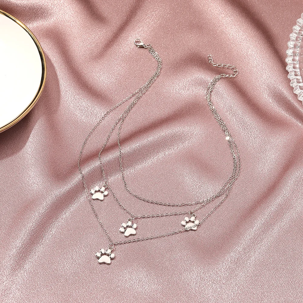 

Fashion New Cute Cat Dog's Paw Pendant Multi Layer Necklace Animals Souvenir Cat's Claw Gold Pendant Necklace for Women Gift