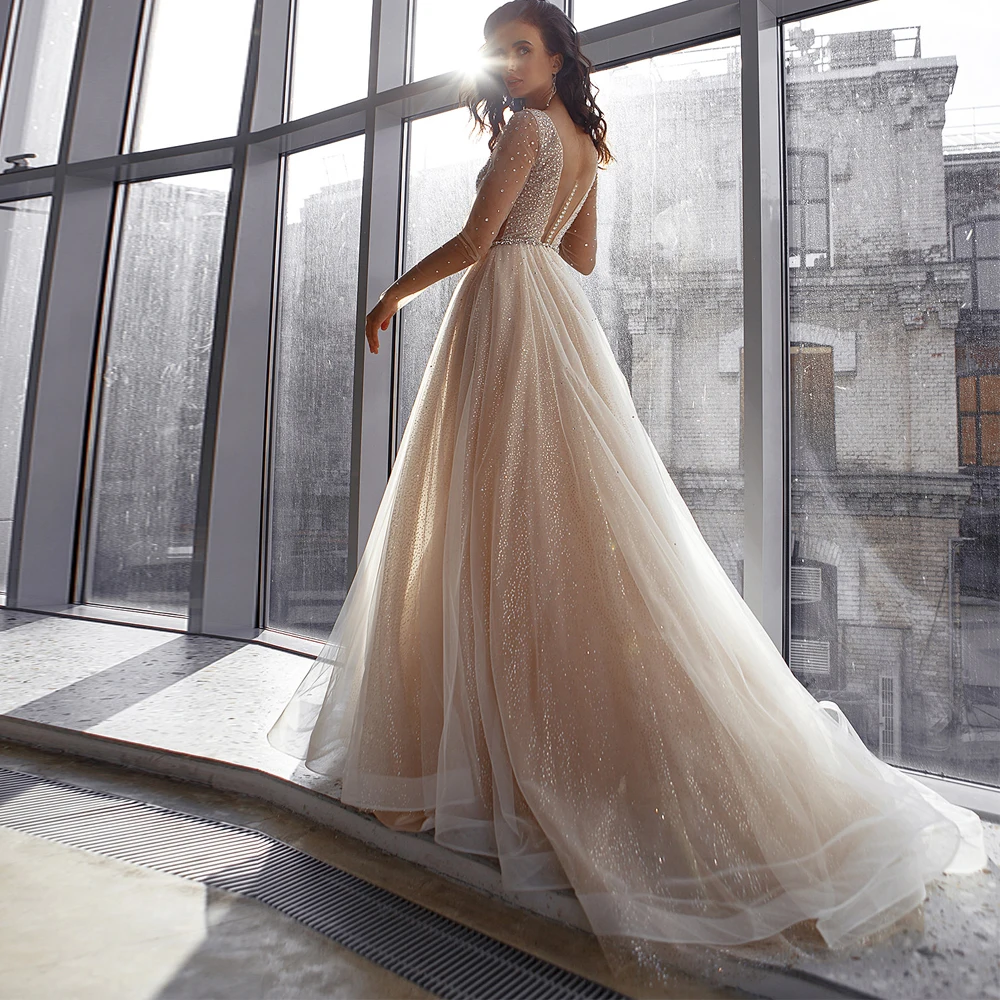 

Vestidos Elegant Wedding Dresses Tulle Sashes Beading Crystal Full Sleeve V-Neck Covered Button Ball Bridal Gowns