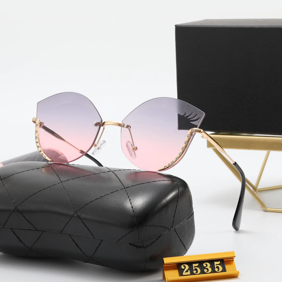 

New heart-shaped rimless sunglasses personality gradient sunglasses rectangular fashion ladies sunglasses cat eye sunglasses