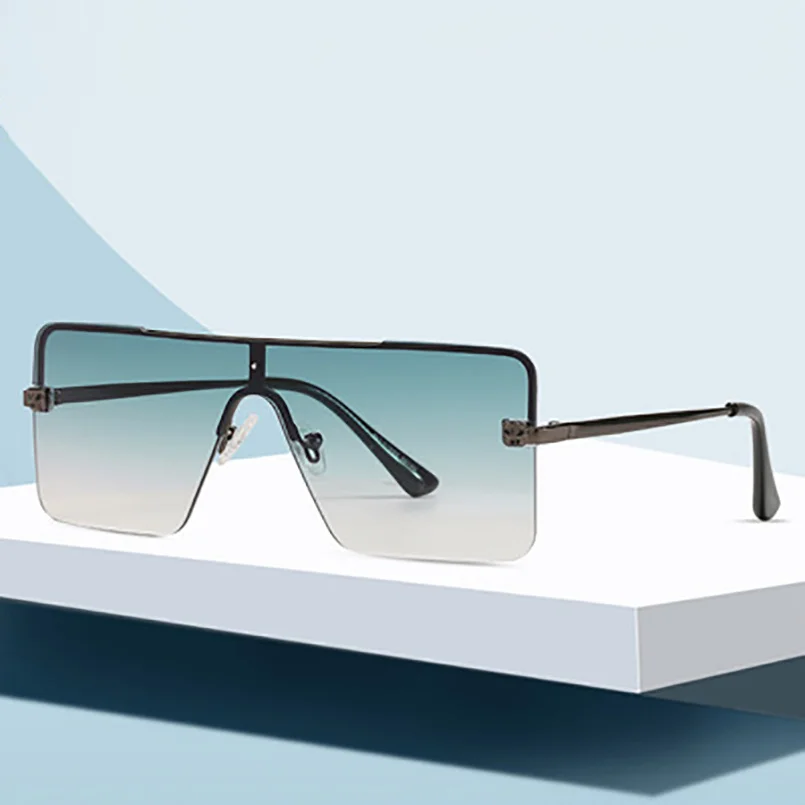 

New Leopard head conjoined piece European and American sunglasses rimless sunglasses for men and women square sunglasses