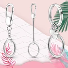Кольцо для ключей женское серебряное с подвесками в виде мелочей