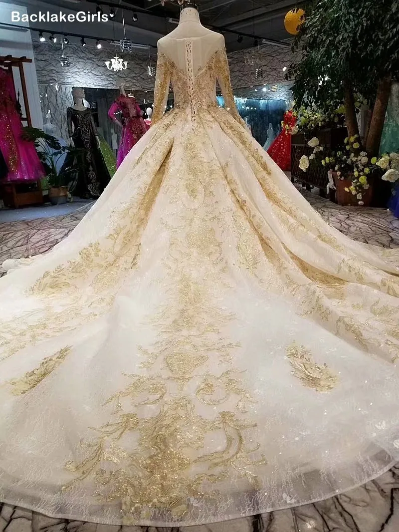 Свадебное бальное платье цвета шампанского и золотого свадебное с круглым