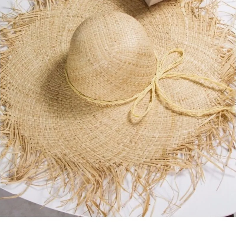 

Ins wind big brim and raw edge natural raffia straw hat women summer holiday seaside holiday wind sunscreen sun hat foldable