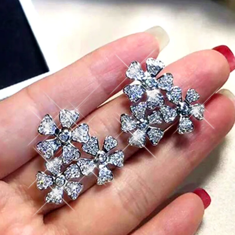 

European and American new style ladies temperament flower earrings small daisy earrings earrings retro earrings wholesale