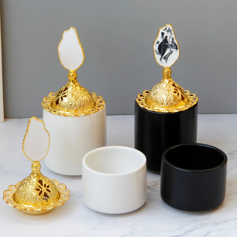 

Simple modern light luxury golden metal matte black and white ceramic incense burner desktop crafts decoration aromatherapy bur