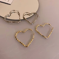 new simple hollow out metal heart hoop earrings for women fashion jewelry boucle oreille femme