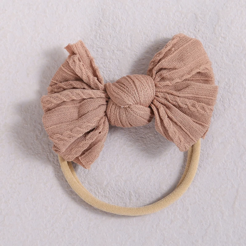 Рисунок 6 - Повязка на голову с бантом для девочек