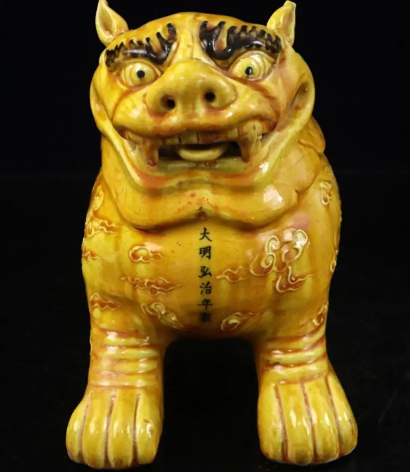 

China Yellow glaze ceramic lion crafts statue