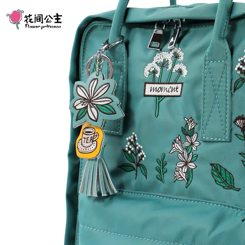 

moment2021 spring new backpack leisure embroidery travel nylon book bag