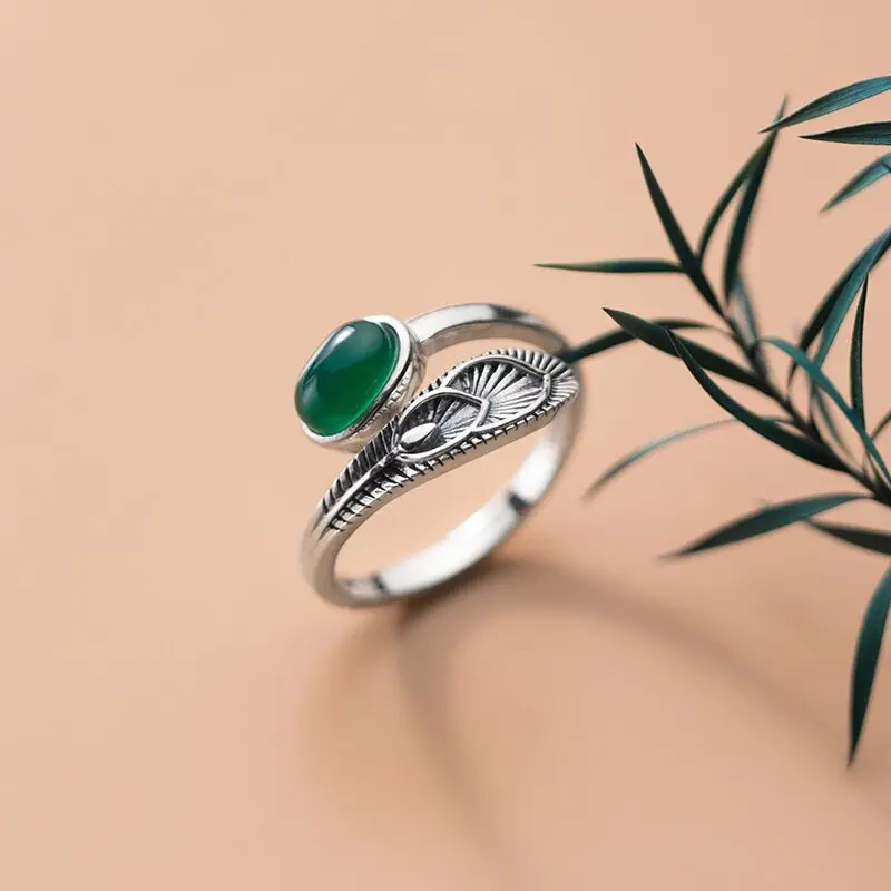 

New hot sale women's retro silver color green stone feather opening adjustment ring fashion trend jewelry gift J01583