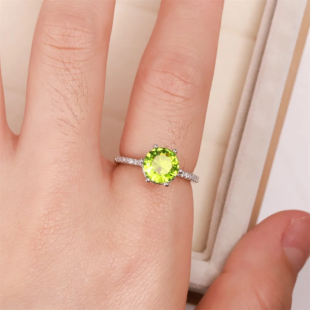 

Sell well in Europe and America S925 silver wedding ring six claw round zircon women's light green crystal jewelry women's gift