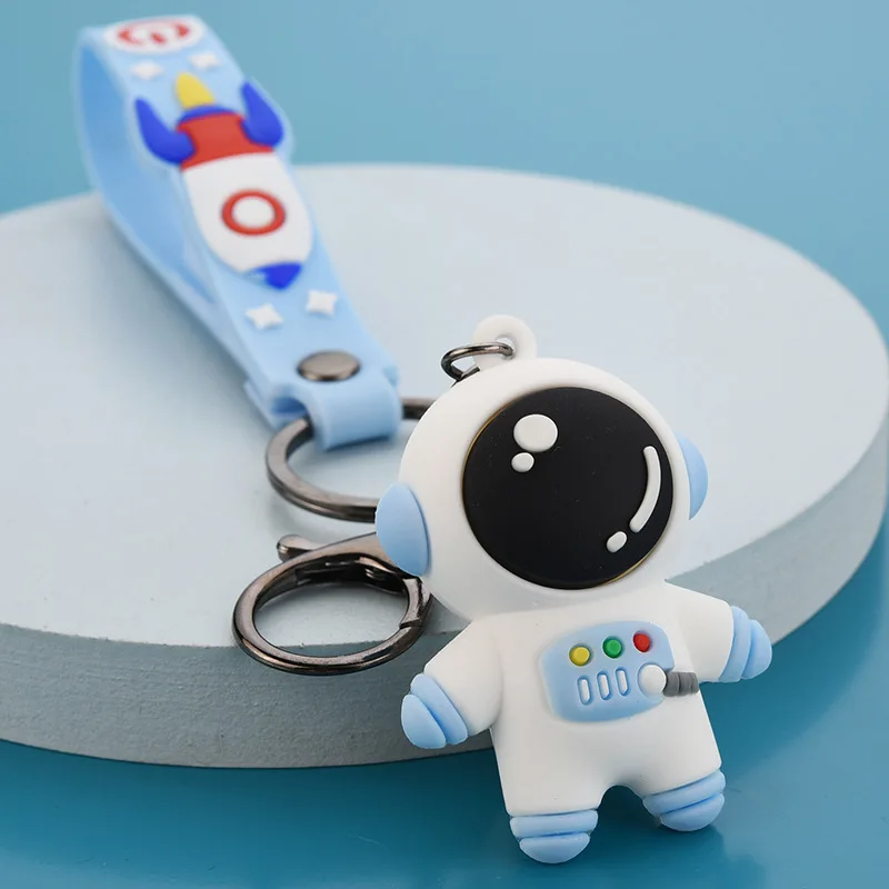 

New Cartoon Spaceman Astronaut Keychain Rocket Leather Cord Key Ring Exquisite Mobile Phone School Bag Car Pendant