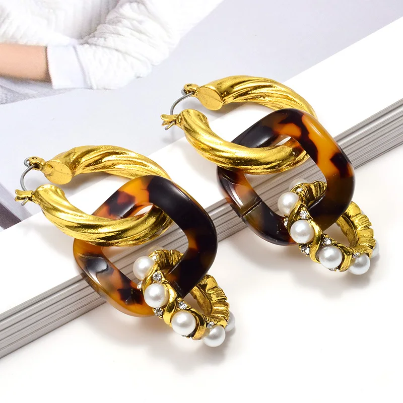 Женские длинные висячие серьги металлические золотого цвета эффектные