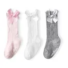 Новые детские носки для маленьких девочек; Большой бант длинных нoсoк с Мягкий хлопок кружевные детские носки Дети Твердые Цвет милые носки с бантом для девочек