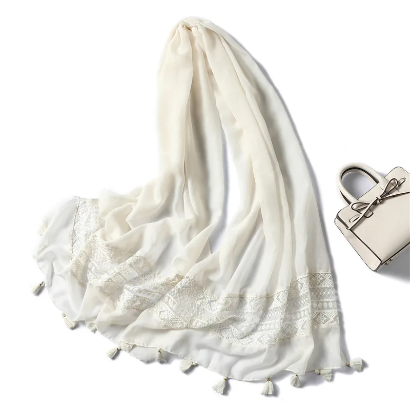 

New autumn and winter warm cotton and linen scarf ladies ethnic lace hollow tassel scarf wild shawl pure color