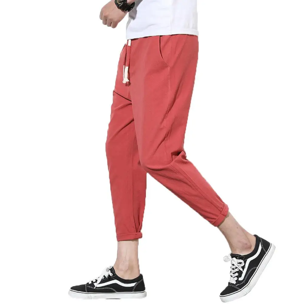 

Men Casual Solid Color Waist Drawstring Long Trousers Loose Cotton Harem Pants