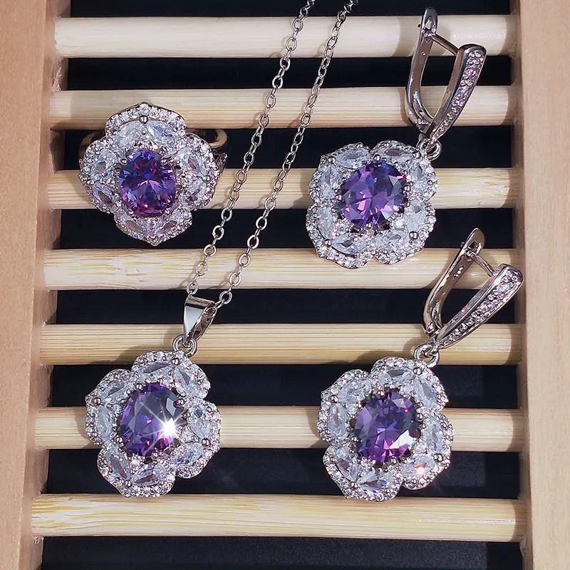 Комплект из колье серёг кольца и браслета серебра 925 пробы |