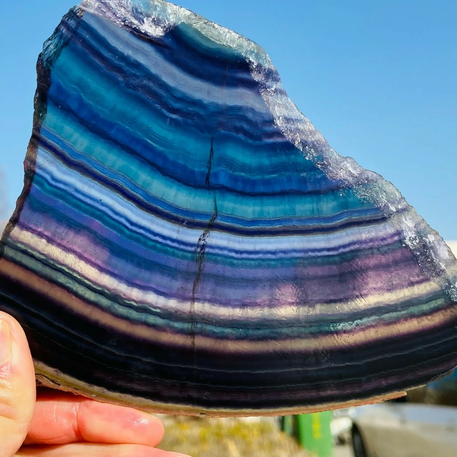 

Magical natural colorful fluorite flat crystal therapy and meditation