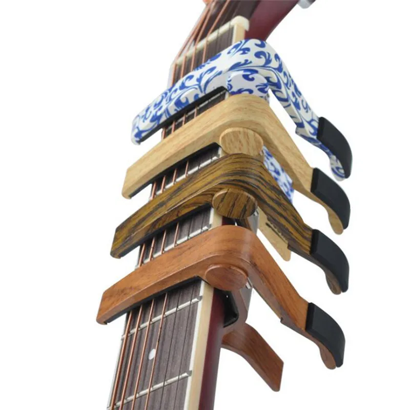 

1pcs Wood Grain Metal Guitar Capo With Perfect Silicon Cushion For Guitar Ukulele Tuning Musical Instrument Parts Guitar Clip
