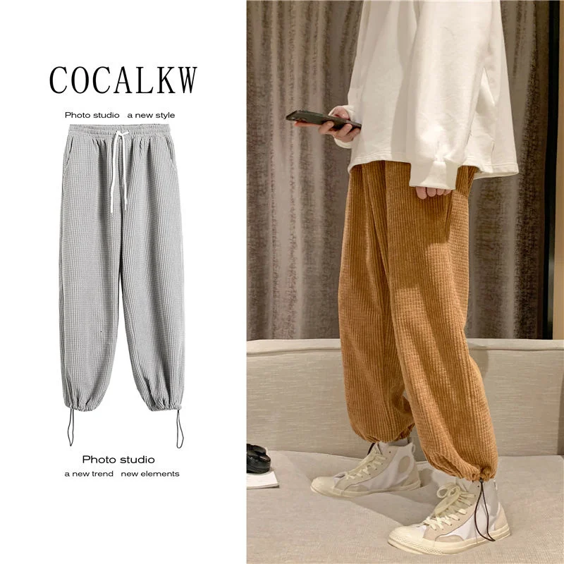 

Men Trousers Solid Color Leggings Corduroy Casual Pants Loose Sports Spring And Autumn Lovers Fashion 2021 New The Price Of