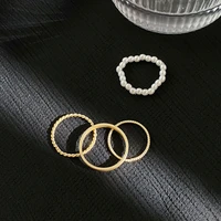4 pieces set of fashionable simple pearl ring plain ring overlapping joint ring personality new womens party jewelry