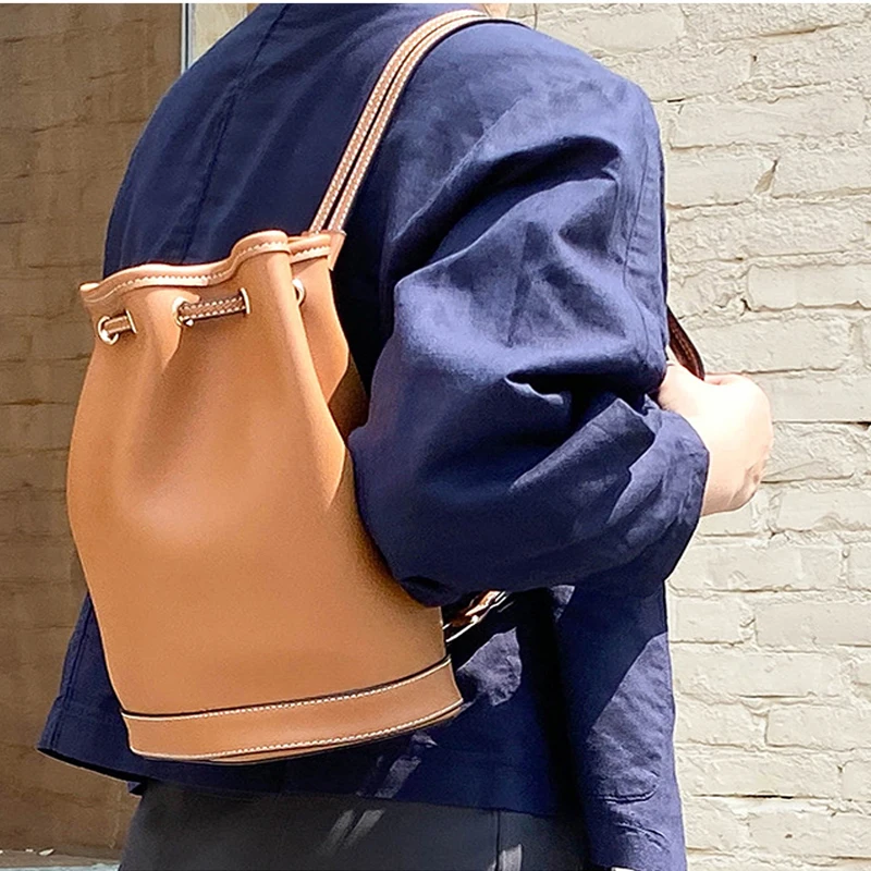 

Korean version of the bag handbag new 2020 fashion cylinder shoulder bag trend retro drawstring ladies portable bucket bag