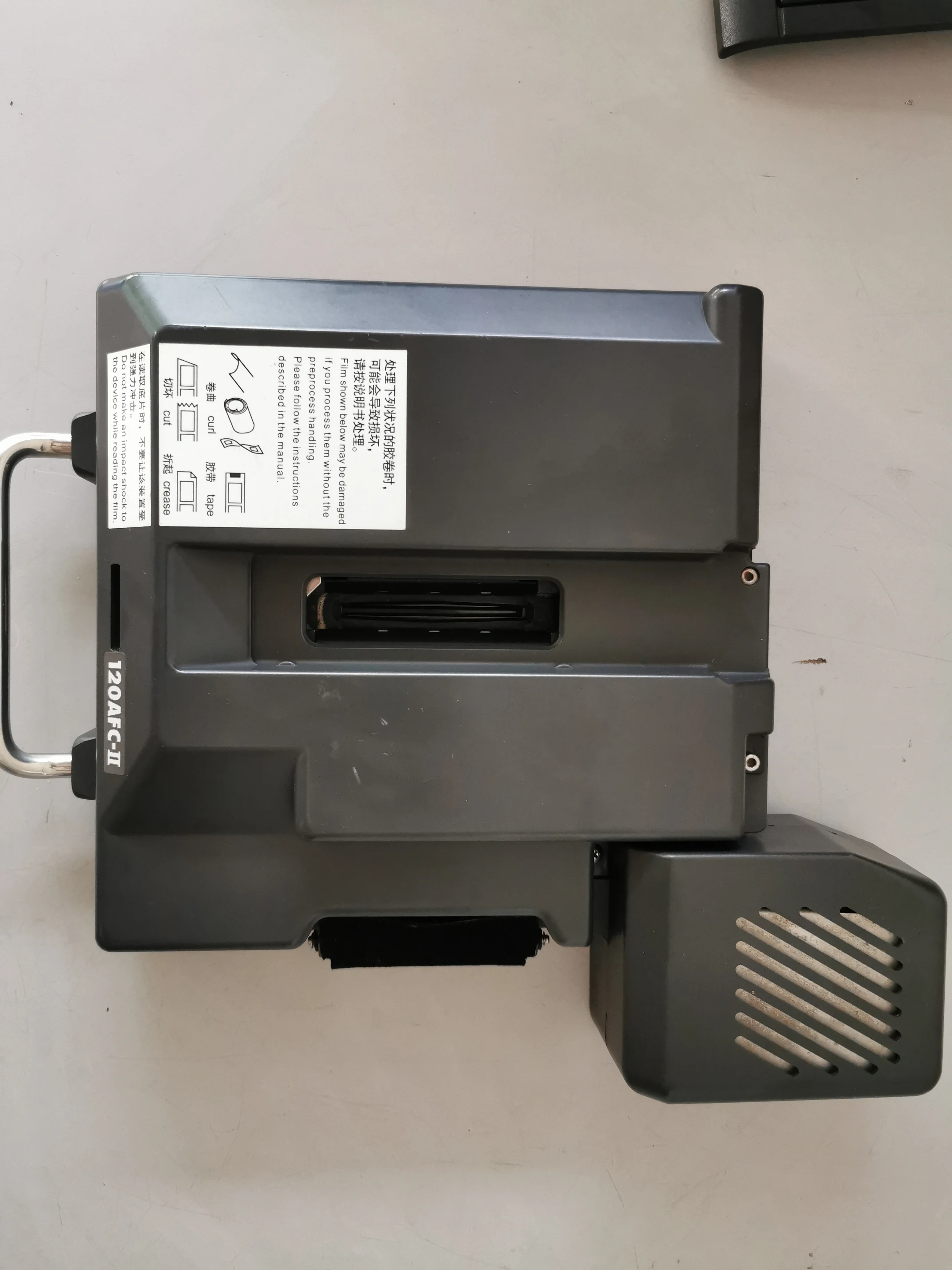 Бывший в употреблении картридж Noritsu 120AFC-II для фотопленки с фотографией сканер