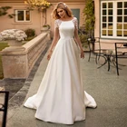 Скромное атласное ТРАПЕЦИЕВИДНОЕ свадебное платье с глубоким вырезом, карманами, кружевной аппликацией, длинными рукавами и пуговицами на спине, 2021