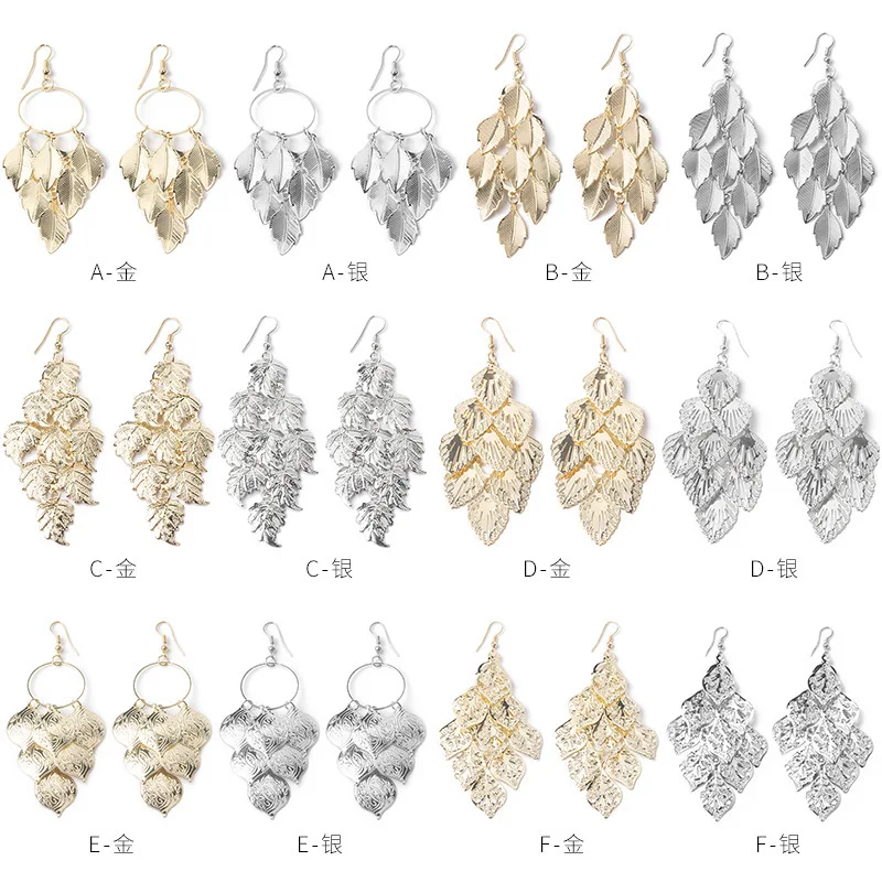 Преувеличенные атмосферные длинные просвечивающиеся листья серьги с надписью