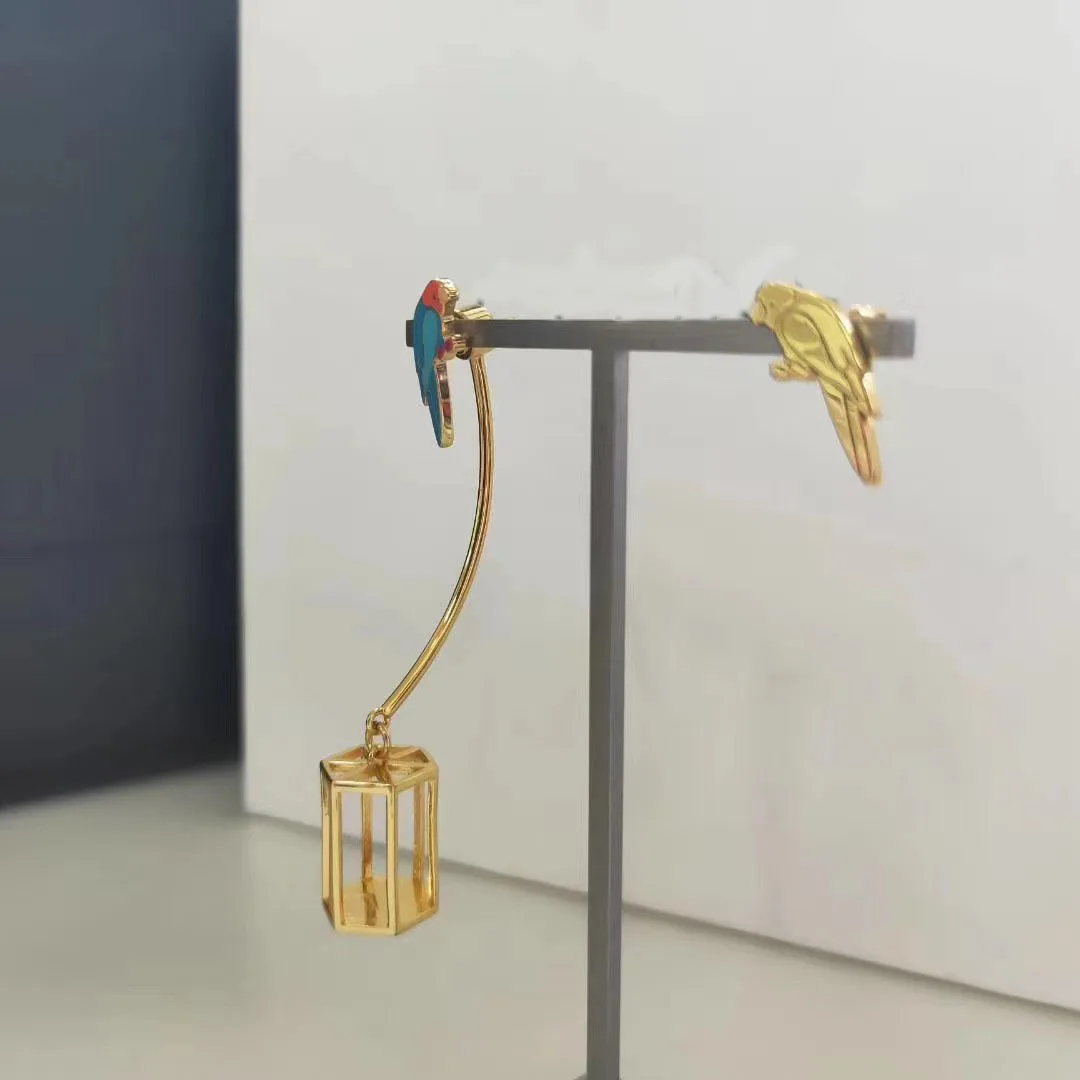 

France Paris Bird Parrot Cage Asymmetric stud earring set allergy free brass 18 k gold plated Small Exquisite safety pin earring
