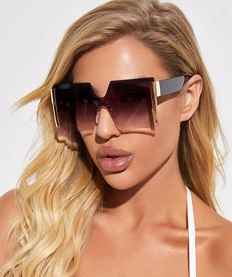 

2021 new fashion personality famous design frameless one-piece Sunglasses Female Personality Street photo show glasses