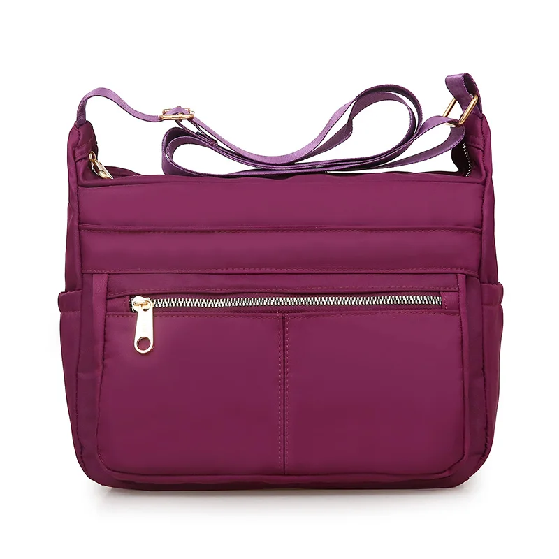 

Waterproof Nylon Solid Shoulder Bag Solid Purple More Zippers Crossbody Bag for Women Contracted joker Messenger Bag Black Hobos