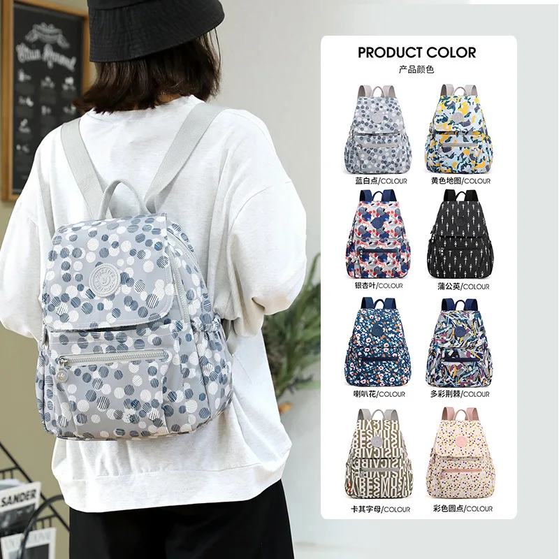 

New printed backpack, trendy student school bag, large capacity outdoor travel lightweight and water-repellent nylon cloth bag