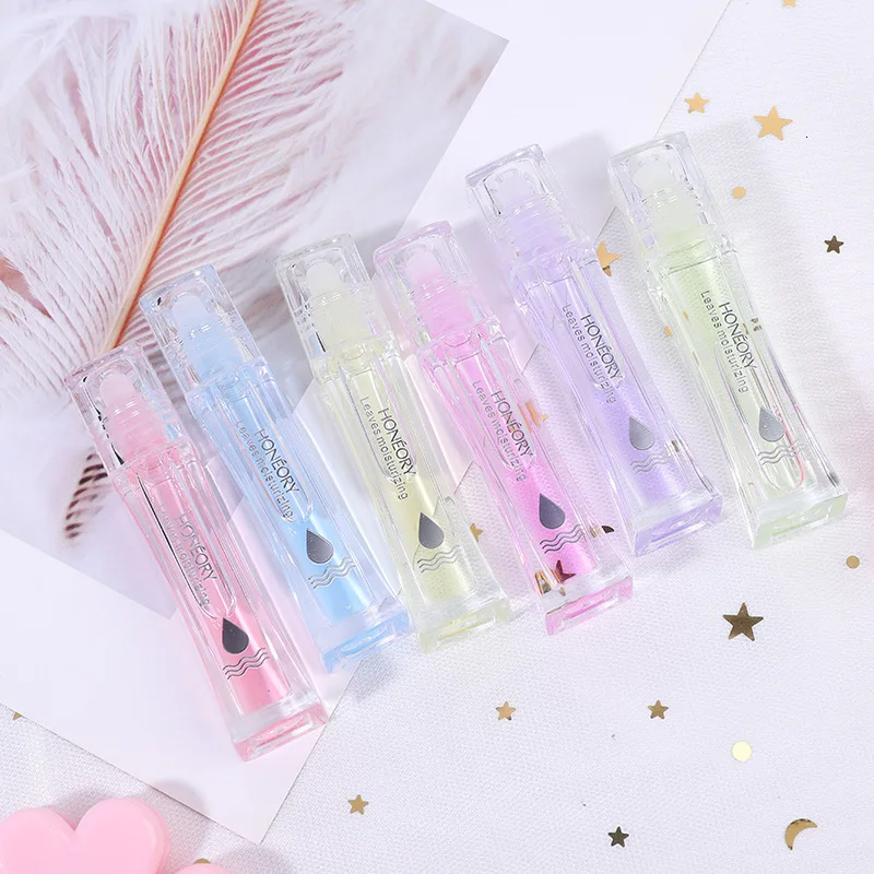 Увлажняющий молочный клубничный блеск для губ прозрачный бесцветный жидкий анти