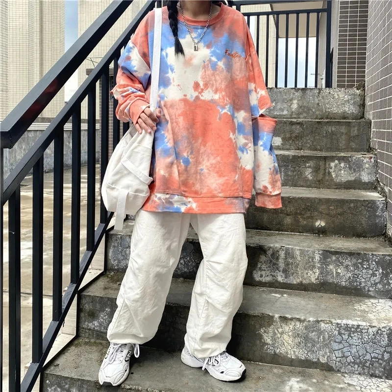 

Hole colored tie-dye sweater women ins super fire 2020 new Korean version loose mid-length long-sleeved top