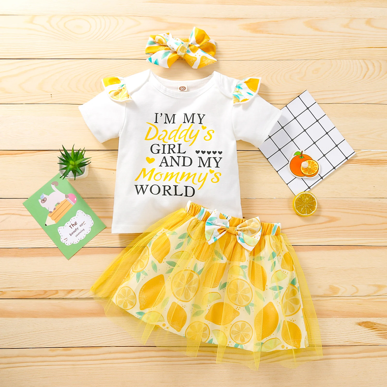 

2021 Girl’s Summer Three Piece Set Special Letter Short Sleeve Tops and Fruit Short Gauze Skirt with Headband
