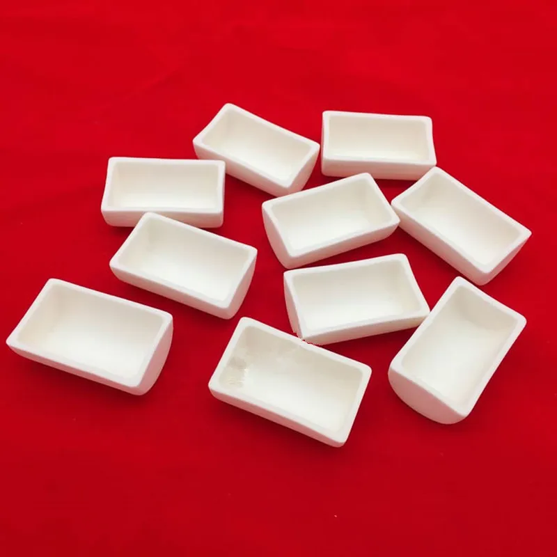 

Semicircle corundum crucible /40x35x25mm/40x25x17mm/Al2O3 ceramic crucible /99.3% alumina crucible /Sintered ceramic crucible
