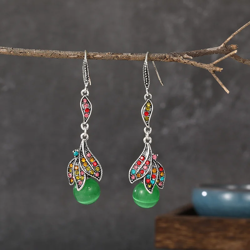 Винтажные серьги в виде кошачий глаз с инкрустированными бриллиантами и