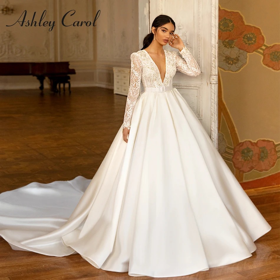 

Ashley Carol A-Line Wedding Dress 2022 Dreamy Beaded Appliques V-Neck Lace Long Sleeve Bride Satin Backless Princess Bridal Gown