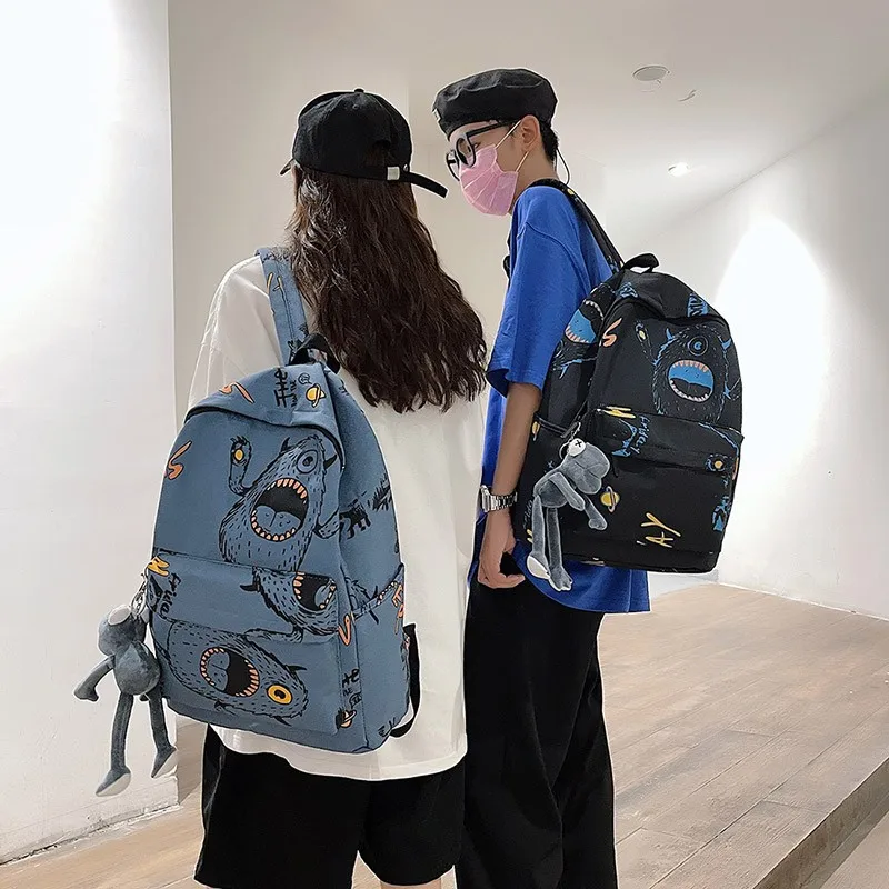 

Cartoon Fashion Pattern Clashing Backpack. Multi-Function Pocket. Large Capacity. Waterproof