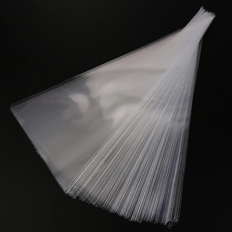 

100pcs Transparent candy packing Bags Wedding Birthday Party Decoration Sweet Cellophane Candy Bag Cone Storage Packaging Bag