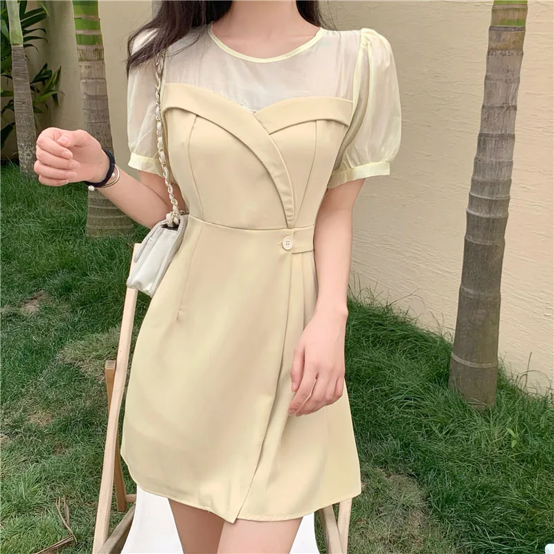 

Korean version 2021 summer new net yarn splicing fake two dresses women's bubble sleeves round collar temperament shows thin