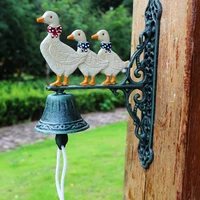 antique green white duck cast iron wall bell mother sons home garden paint colored double sided hand cranking welcome door ring
