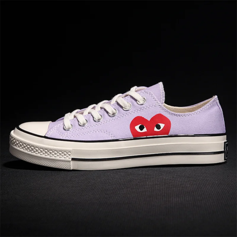

European station 2021 new men's and women's red heart high and low top casual canvas sports shoes