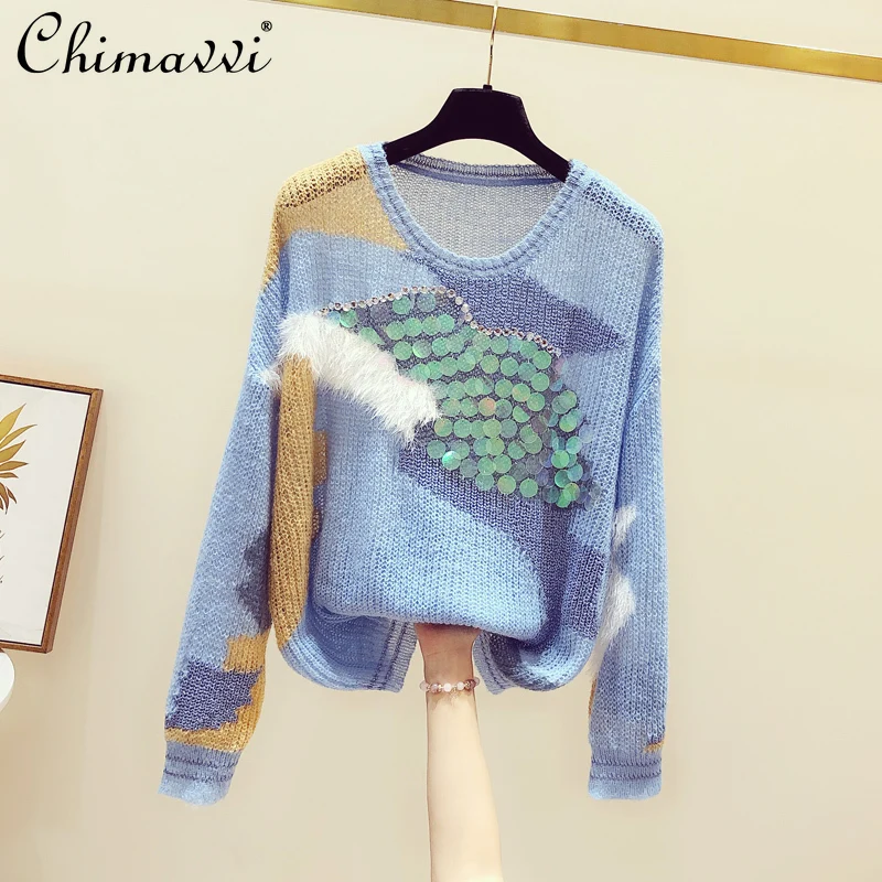 

Женский тонкий трикотажный пуловер с блестками и длинным рукавом